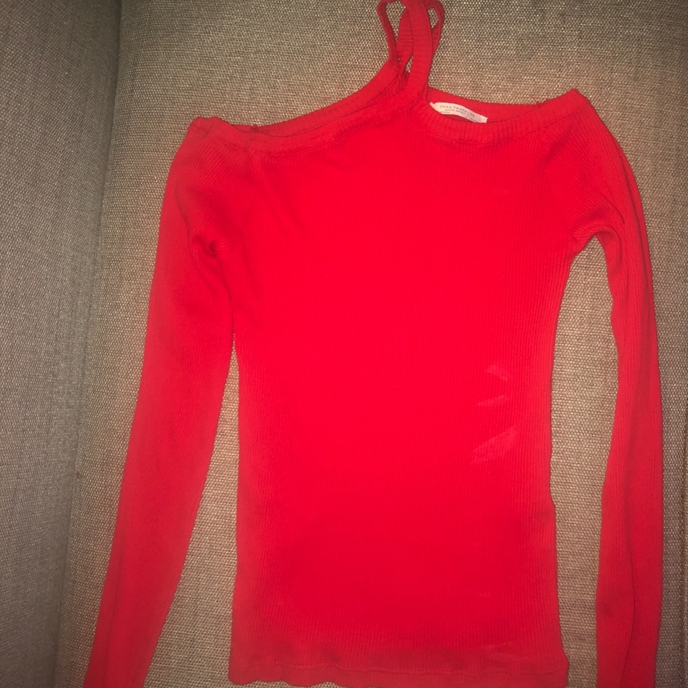 Red Zara shirt.